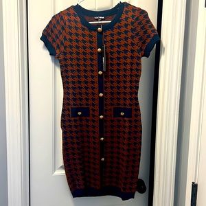 FashionNova sweater dress. Never Worn . Tag says Large but fits Small/Medium.